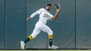 Athletics outfielder Denzel Clarke catches a fly to centre field during the third inning of a baseball game against the Philadelphia Phillies Saturday, May 24, 2025, in West Sacramento, Calif. (Sara Nevis/AP)